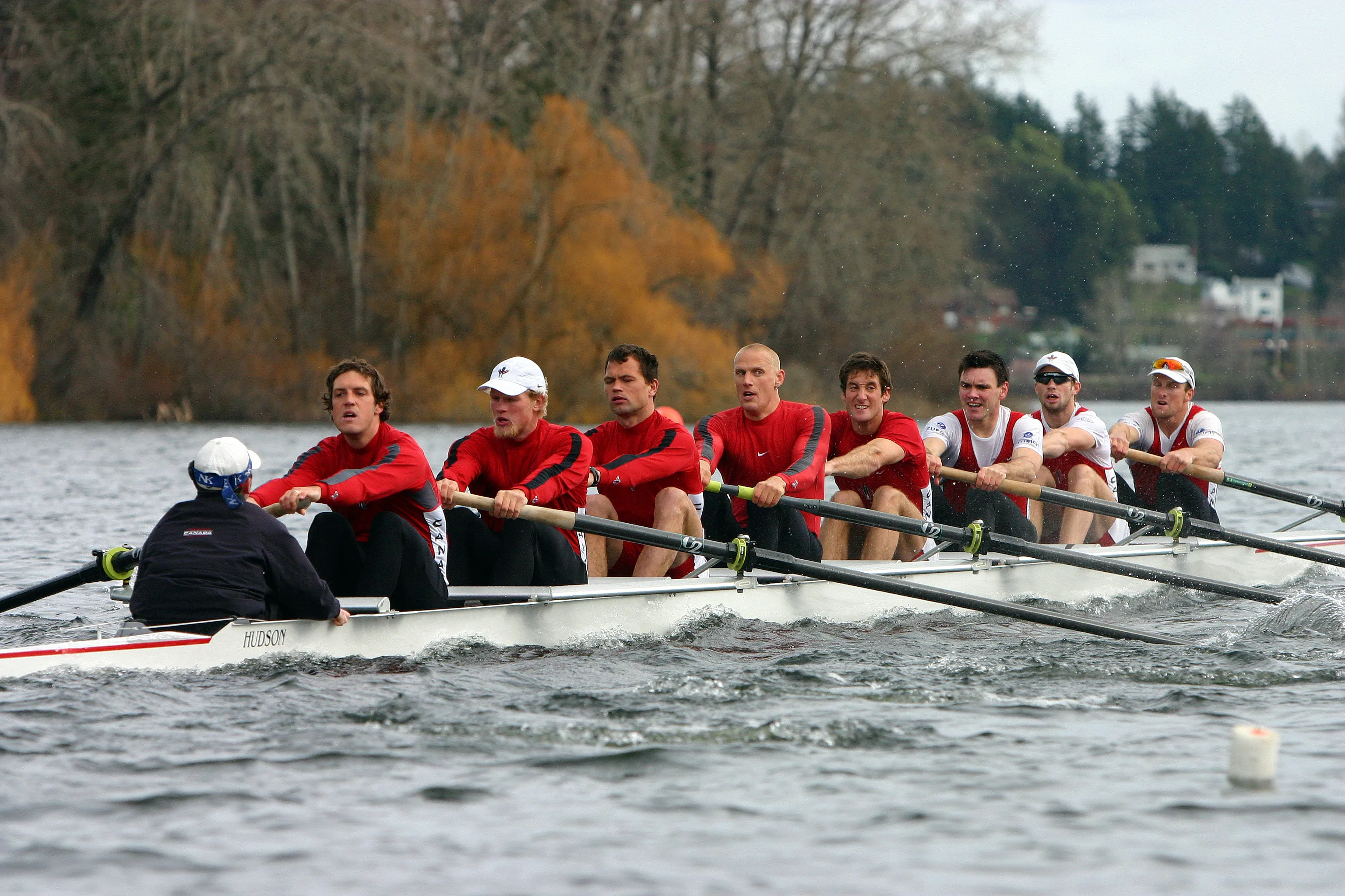 Mike, with the rowing crew on a fall lake.